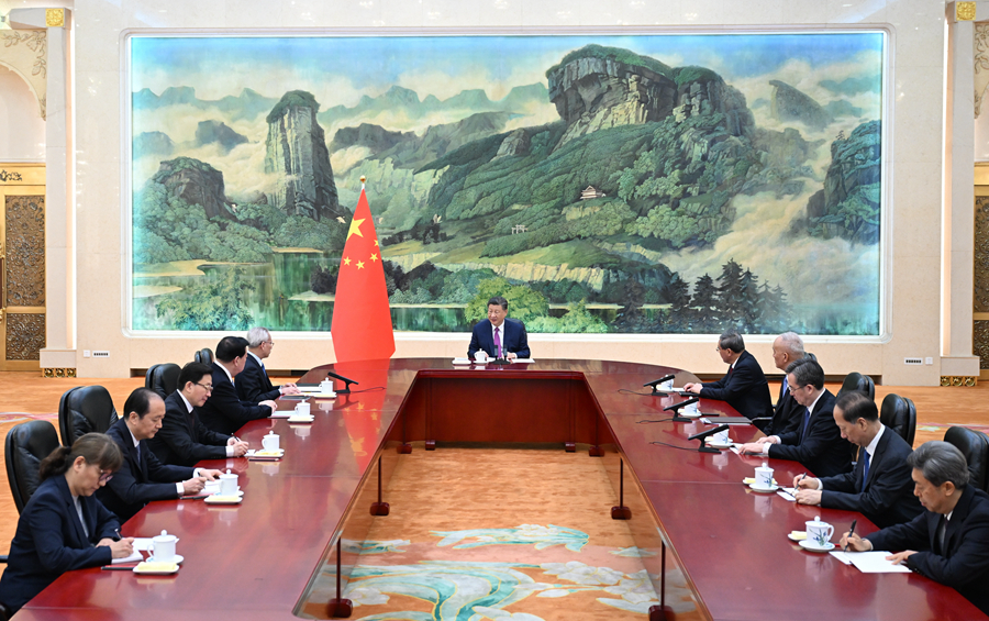 64.3.习近平会见澳门特别行政区候任行政长官岑浩辉.jpg